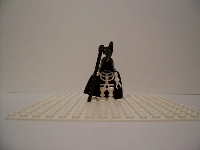 lego man dressed up like the Grim Reaper