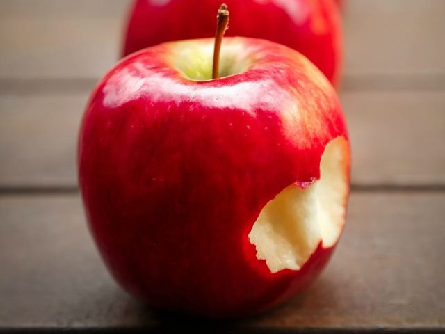 Apple with a bite out of it