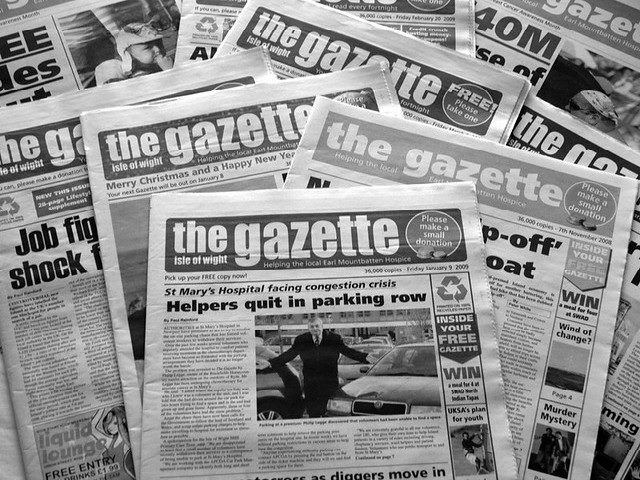 stack of newspapers named the Gazette