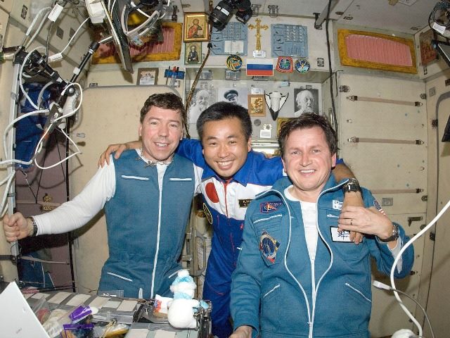 Expedition 19 Flight Engineer Michael Barratt (left), Expedition 18/19 Flight Engineer Koichi Wakata and U.S. spaceflight participant Charles Simonyi.