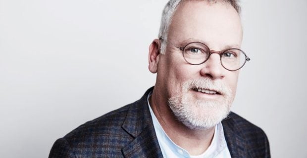 A headshot of author Michael Connelly in piece about finding inspiration for customer needs.