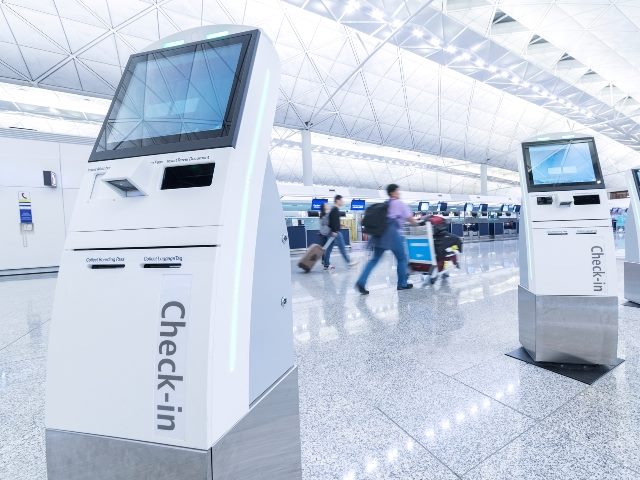 Self-service machines and help desk kiosks at an airport for check-in, showing an example where a customer experience leader would implement service design techniques for improvement.