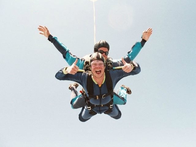 skydiving, two thumbs up
