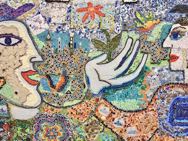 mural depicting collaboration between an  artist and a scientist