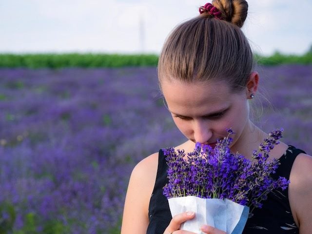 woman smelling lavender