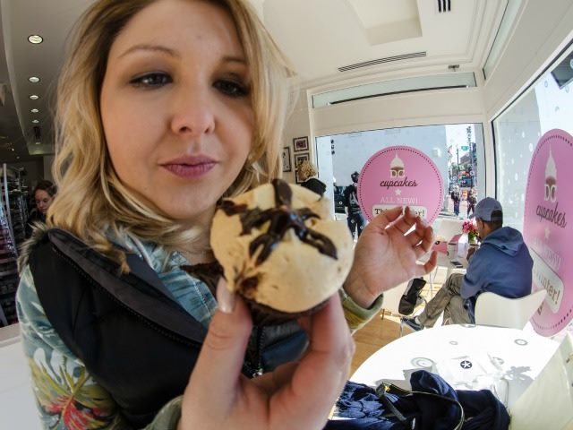 contemplating a cupcake