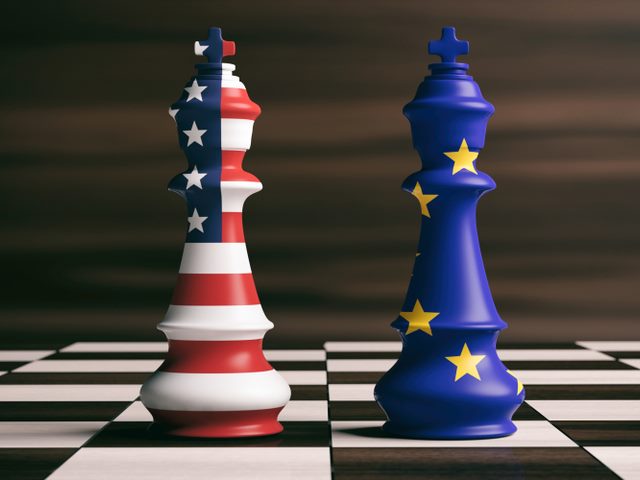 chess pieces on a board with US and European Union flag design