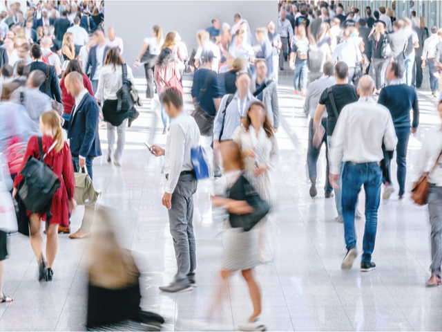 A large crowd of anonymous blurred people - Anonymous customer data concept