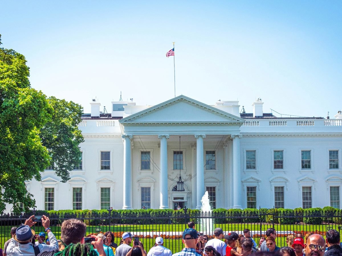 People in front of the White House.