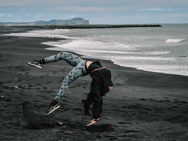 back flip on a beach in Iceland