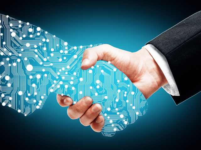 A customer shaking hands with a digital partner over a blue background