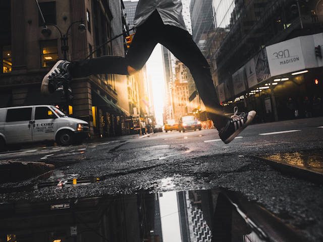 jumping over a puddle