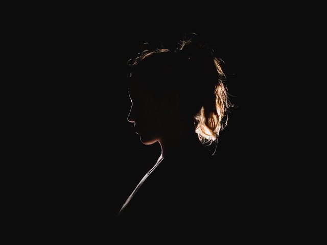 a woman in shadows
