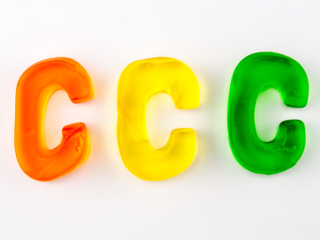 A set of three gummy letters in the shape of C isolated on white - customer experience concept