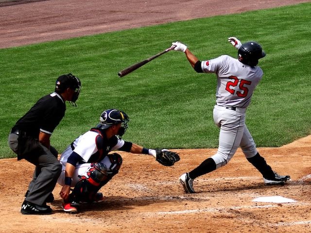 baseball player swinging a bat