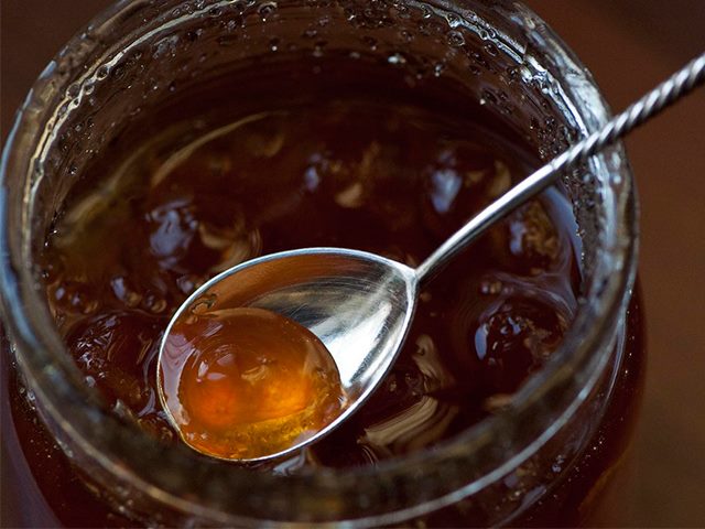 Cherry jam in a jar. 