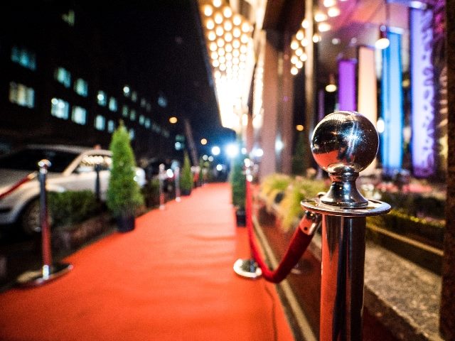 Empty red carpet entrance, symbolizing how for b2b marketing strategies, getting famous should be a priority. 