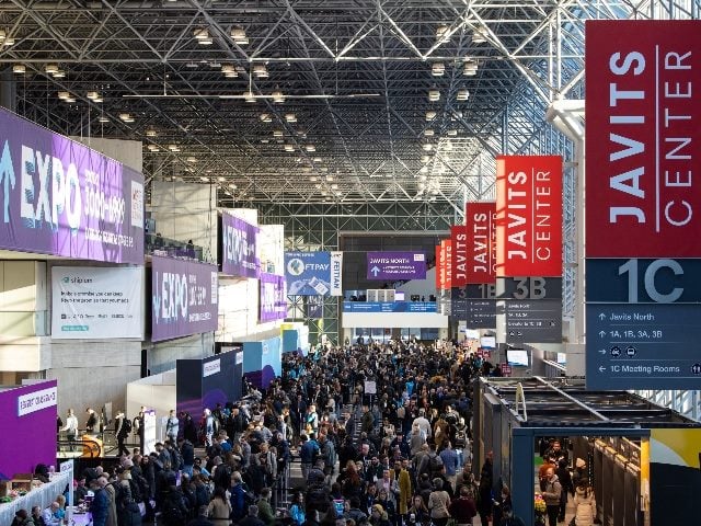 Scene of the crowd mingling in the conference hallway at the NRF Big Show 2025