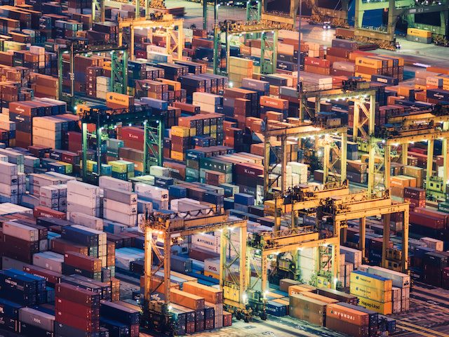 containers stacked up in a port