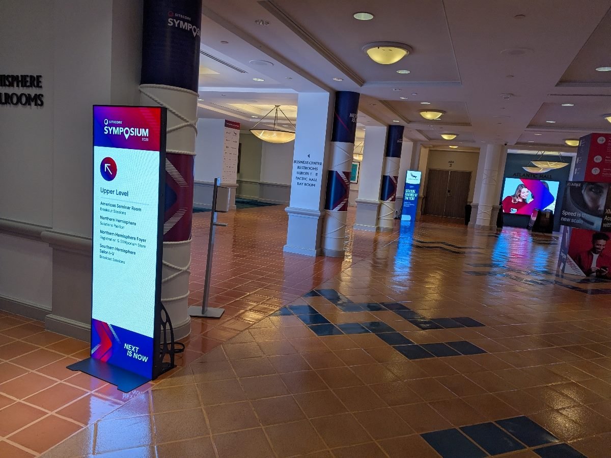 A conference hallway with Sitecore signage at the Sitecore Symposium 2025 at the Walt Disney Dolphin Resort in Orlando, Fla.