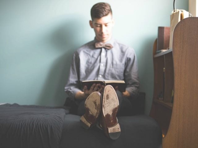 man reading a book