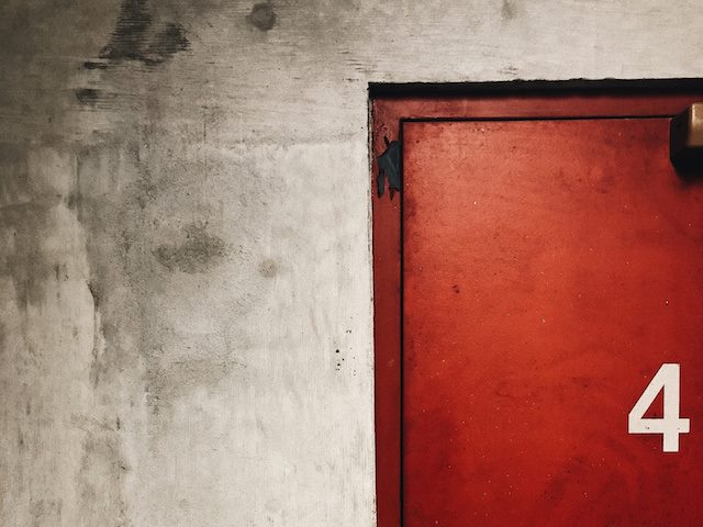 red door with number four on it