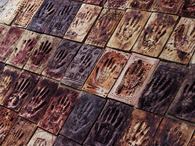 Unity and Diversity in Hand Print Relief Community Artwork.