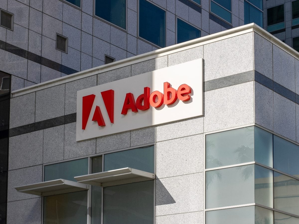 Adobe headquarters in downtown San Jose, California, with the Adobe logo mounted on the exterior facade. Adobe is a global software company known for its digital experience, marketing and creative platforms.