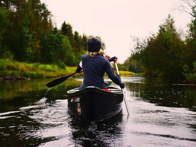 paddling a canoe