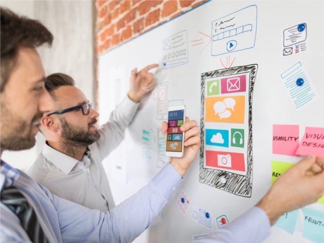 developers and UX designers working on app and cloud architecture