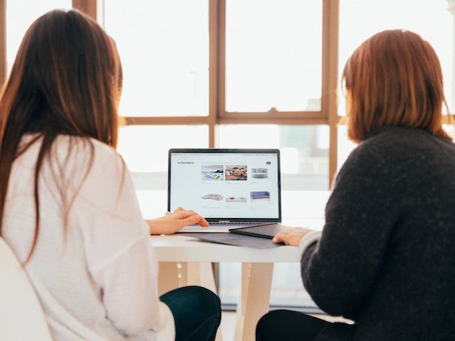 two women conducting a search in a web browser