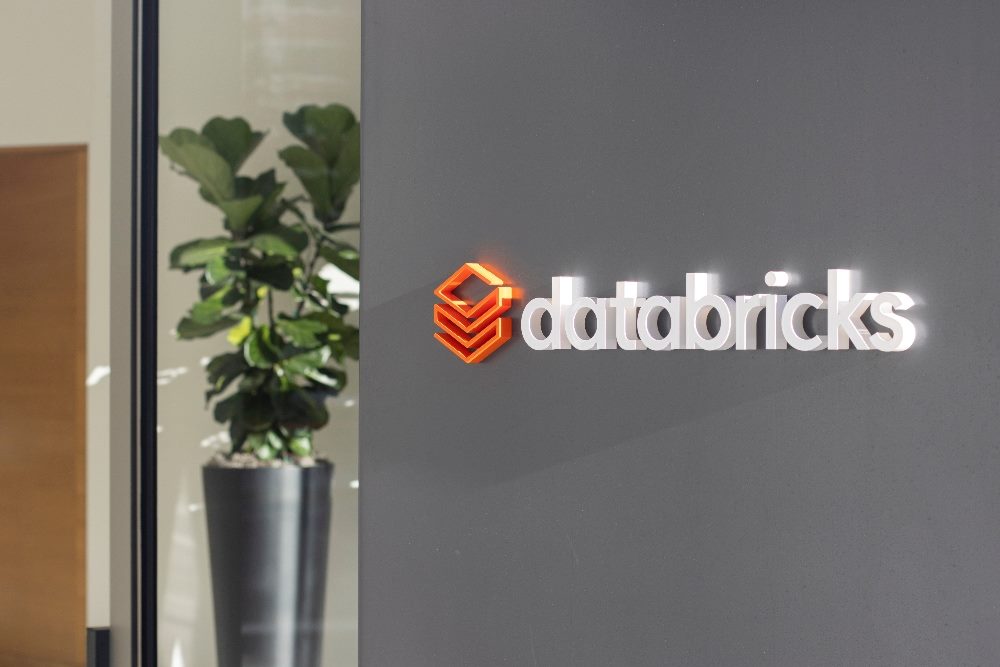 Databricks logo is seen at the entrance to its headquarters in San Francisco, California. Databricks is a cloud-based data engineering tool.