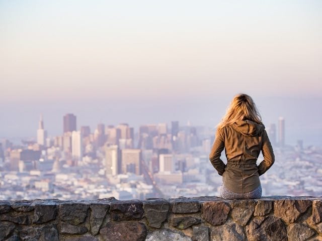 Woman on rock platform