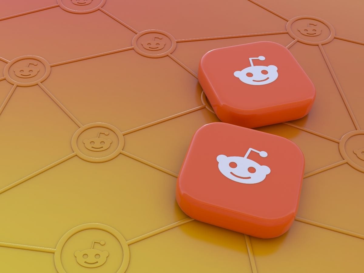 3D illustration of Reddit icons on orange gradient tiles connected in a network pattern, representing community-driven conversations and AI citation sources.