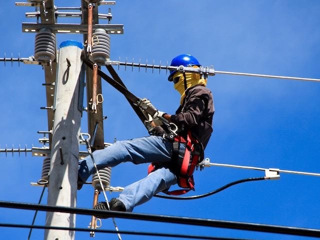 line worker  for  electric  company at work