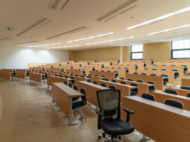 An empty classroom with tiered seating