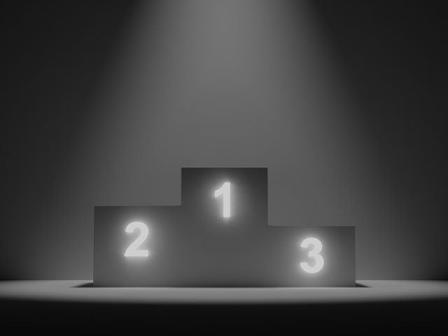 black and white podium with ranking of 1, 2 and 3