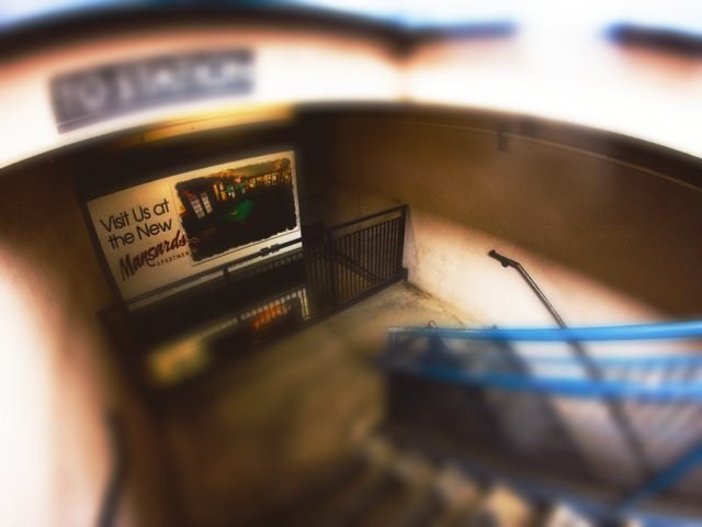 Gray Concrete stairs Leading to train Station