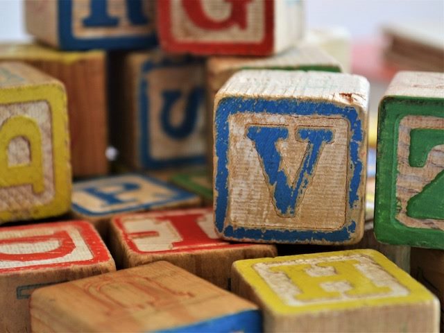 pile of children's alphabet blocks
