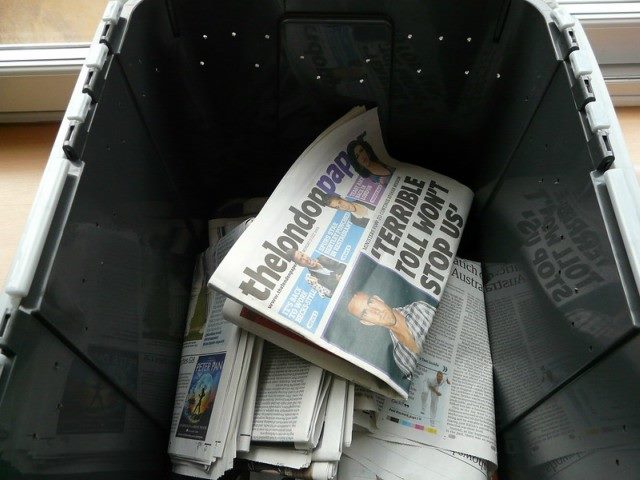 Newspapers inside a container.