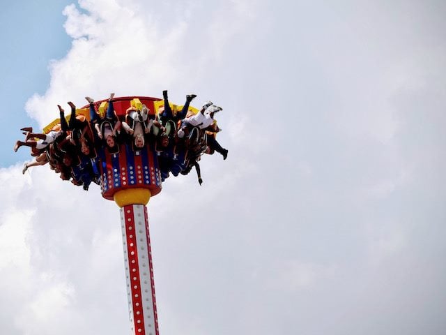 upside down people on a coney island ride