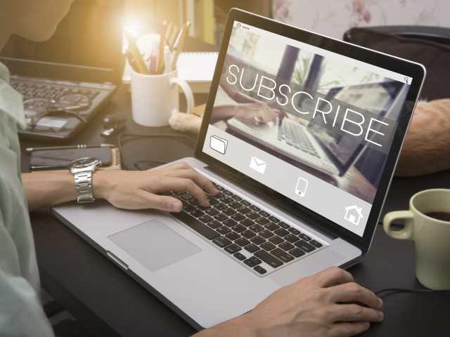 A computer user about to subscribe to a web-based service.