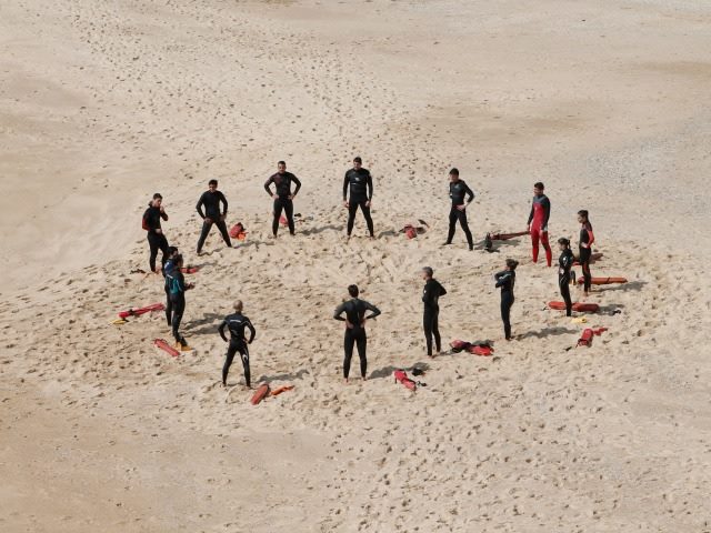 team motivational meeting on beach