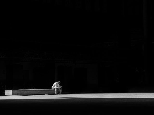 man working in isolation