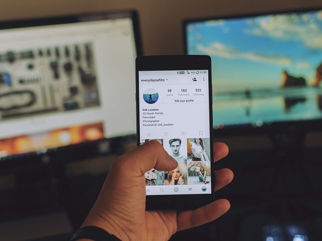Instagram user browsing photos. 
