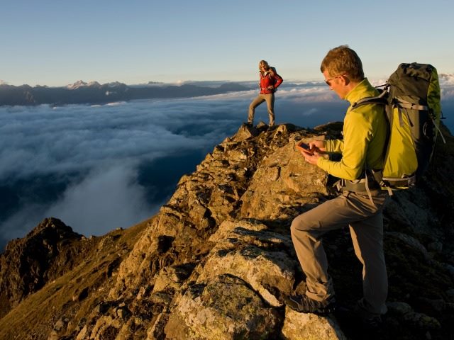 top of mountain with smartphone