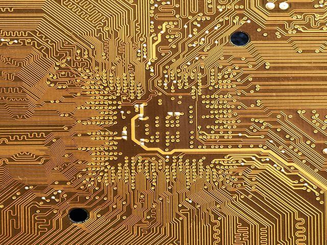 gold abstract of a computer chip closeup