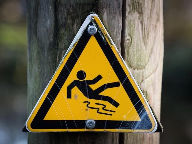 warning sign: slippery surface, tripping hazard