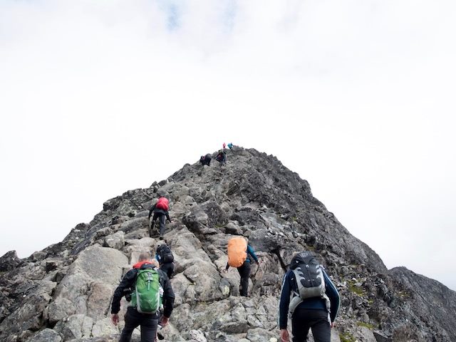 mountain climbing with a group