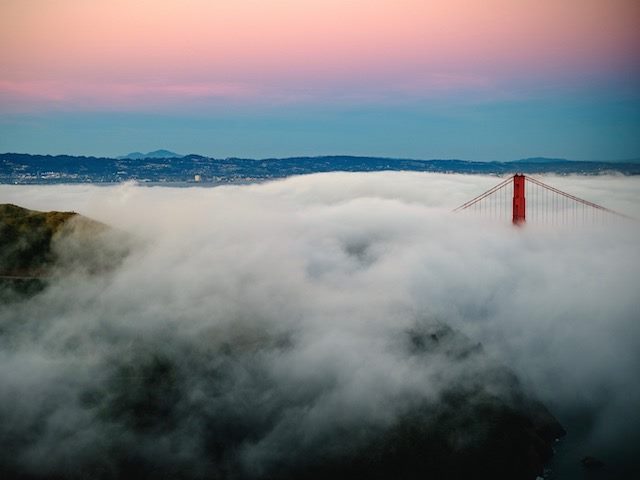 Golden Gate Bridge covered in fog
